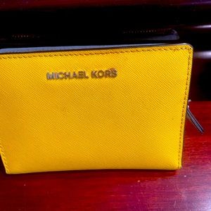 Yellow Michael Kors small wallet good condition